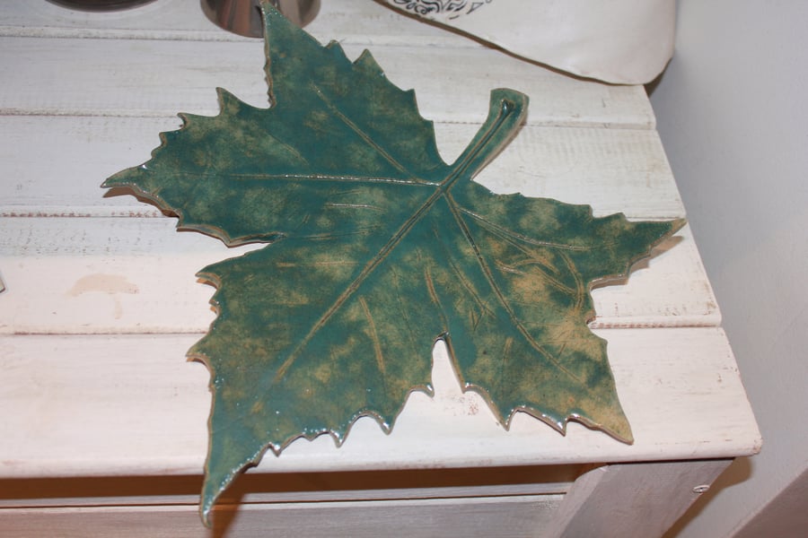 Handmade ceramic leaf decoration