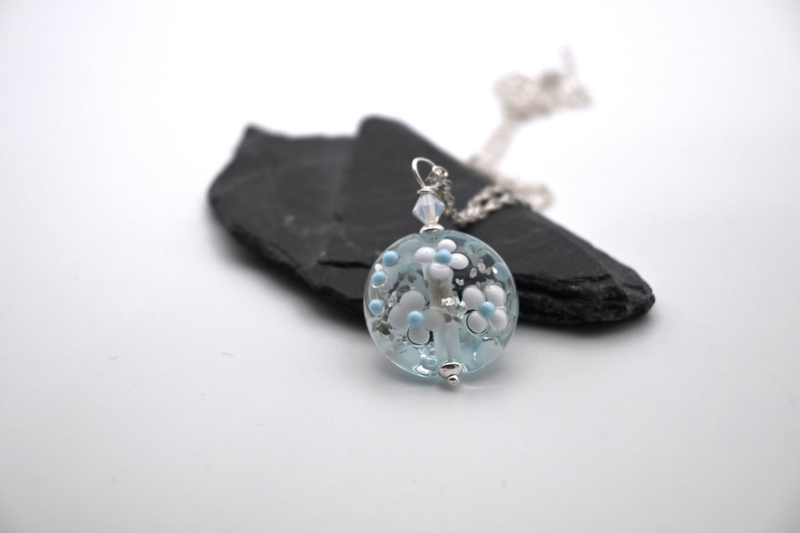 blue and silver glitter lampwork glass flower pendant necklace