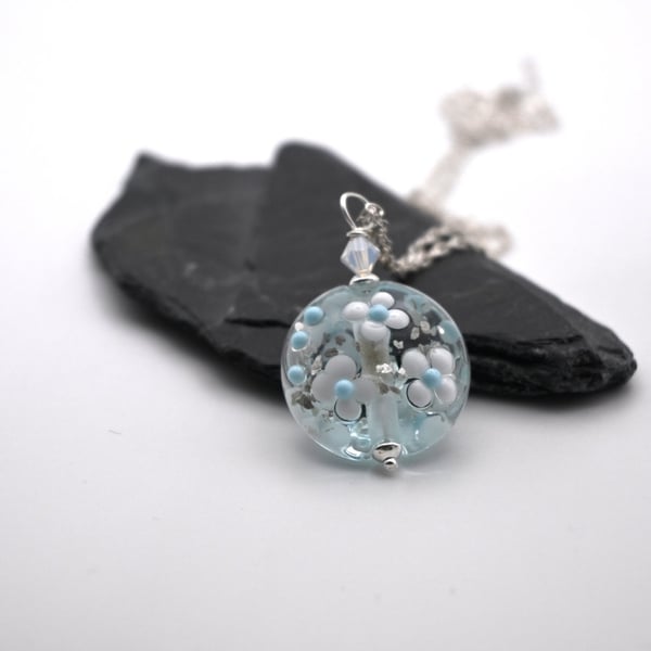 blue and silver glitter lampwork glass flower pendant necklace