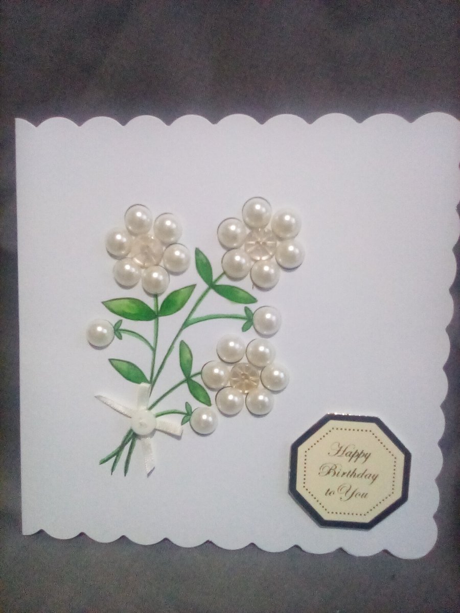 A beautiful unique floral watercolour and embellished handmade Birthday card