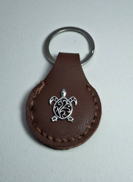 Brown Leather Hand Stiched Keyring.  Turtle charm stitched onto front.
