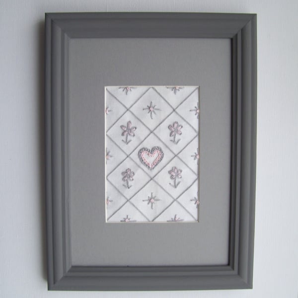 Framed diamond pattern embroidery of hearts, flowers and stars - pink & grey