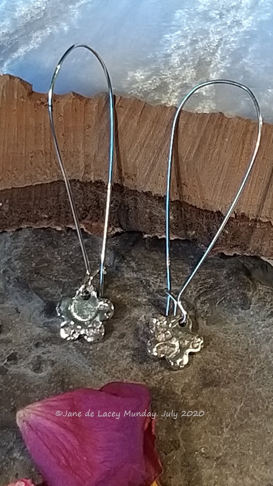 Silver Flower Earrings on Giant Kidney Earwires.