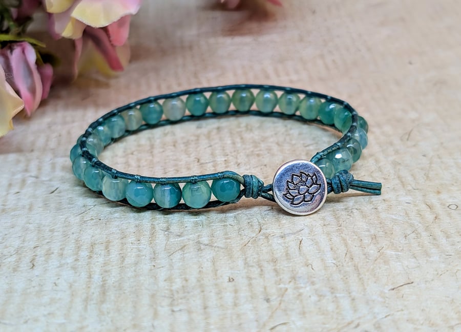 Blue-green faceted agate and leather bracelet with lotus button closure 
