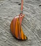 Red Fire Volcano Cherry Quartz Half Moon Pendant - Image 1