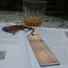 Patinated copper bookmark with leaf pattern
