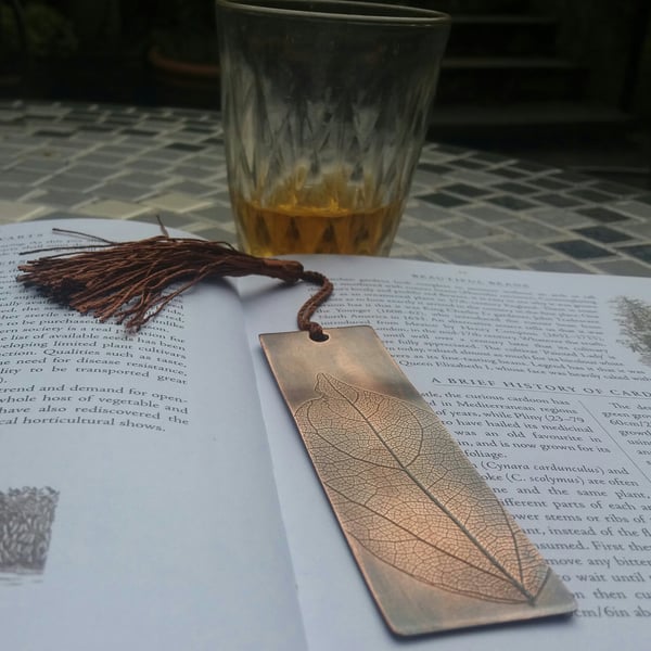 Patinated copper bookmark with leaf pattern