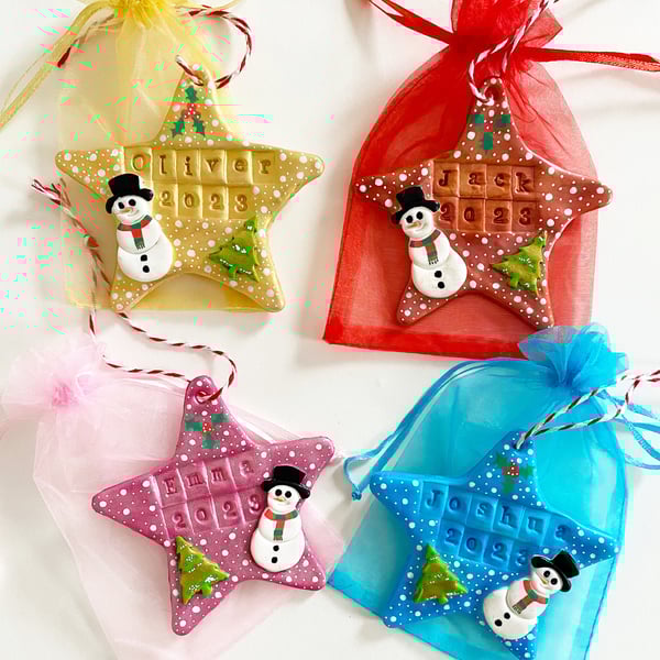 Handmade personalised Christmas star decorations 