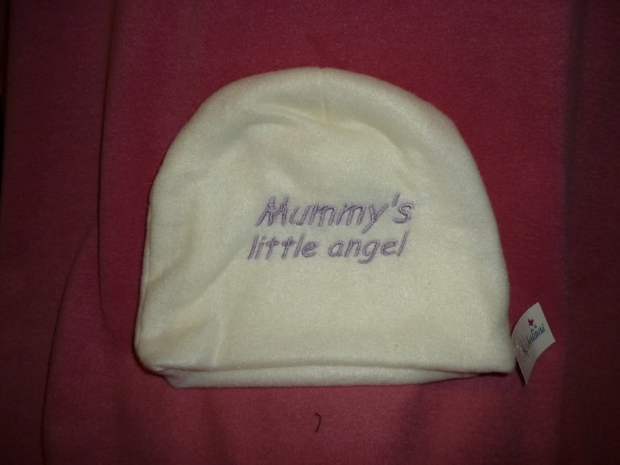 Baby hat in cream fleece fabric -lilac writing mummys little angel