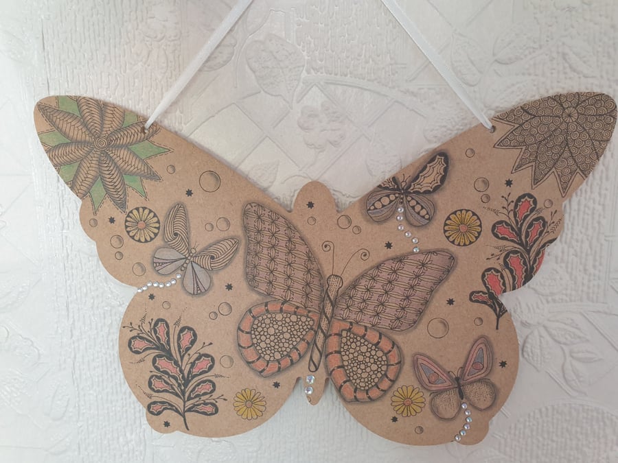 Wooden hand drawn butterfly wall hanging