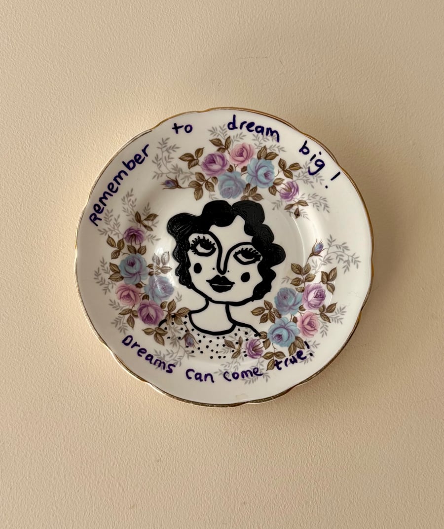 "Dreams can come true" vintage plate up cycled to wall art.