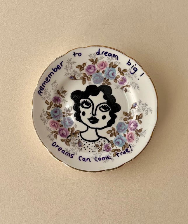 "Dreams can come true" vintage plate up cycled to wall art.