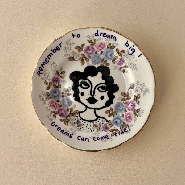 "Dreams can come true" vintage plate up cycled to wall art.