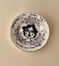 "Dreams can come true" vintage plate up cycled to wall art.