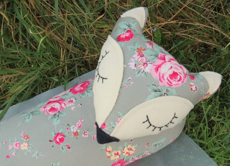 A snoozy fox draught excluder.  90cm in length. 