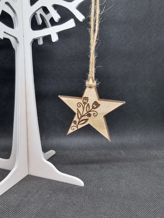 Star and flowers, laser-cut and laser-etched on wood