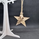 Star and flowers, laser-cut and laser-etched on wood