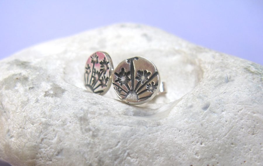 Fine silver starburst stud earrings