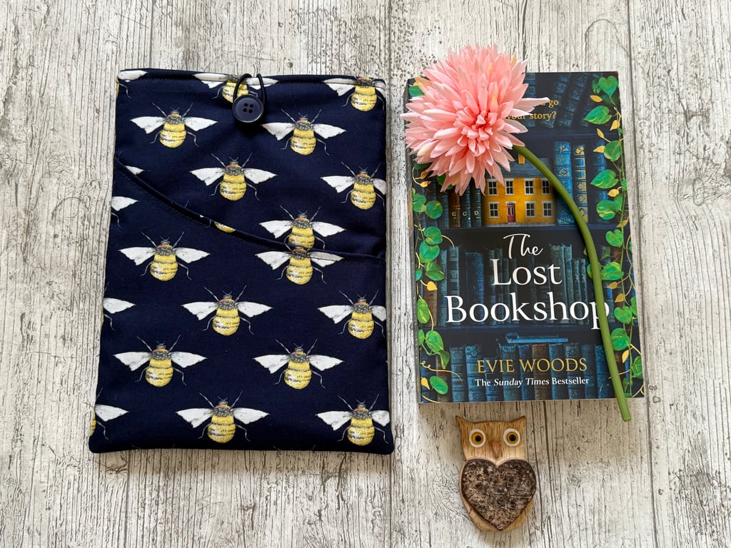Bee themed book sleeve with pocket for paperback book padded and fully lined. 