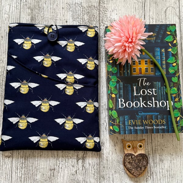 Bee themed book sleeve with pocket for paperback book padded and fully lined. 