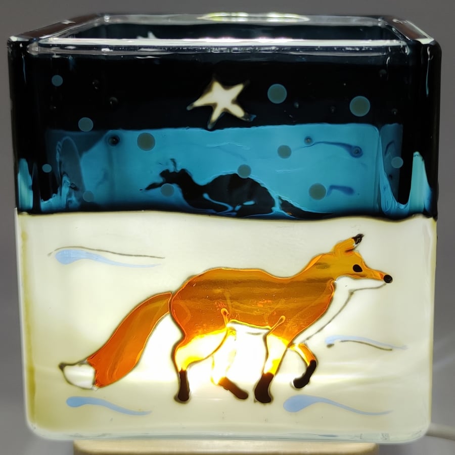 Hand painted glass candle holder, foxes hunting in the snow