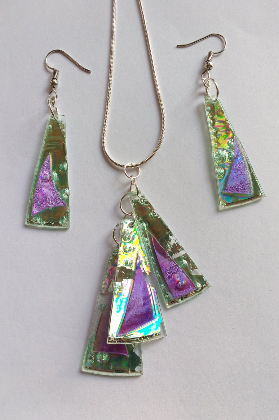 Matched set of earrings and pendant.