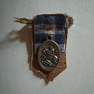 Hand-sewn St George's medal brooch