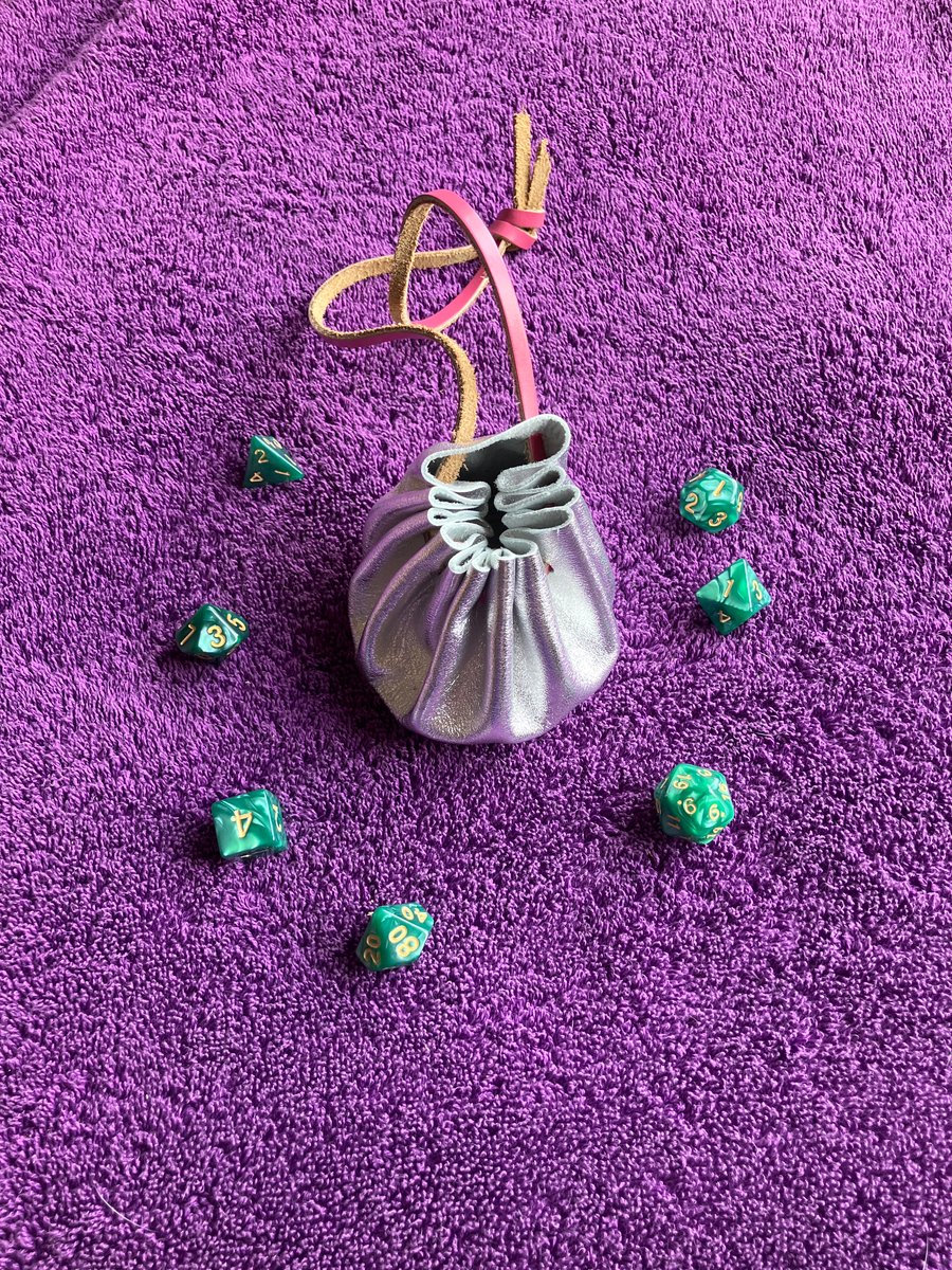 Dice Bag: Small metallic silver coloured leather drawstring pouch 