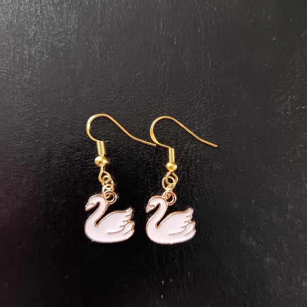 White and gold swan charm dangle earrings 