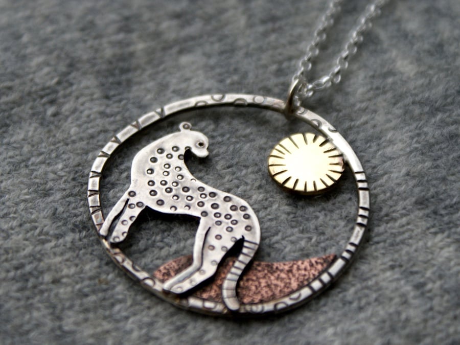 Sun worship pendant - cheetah