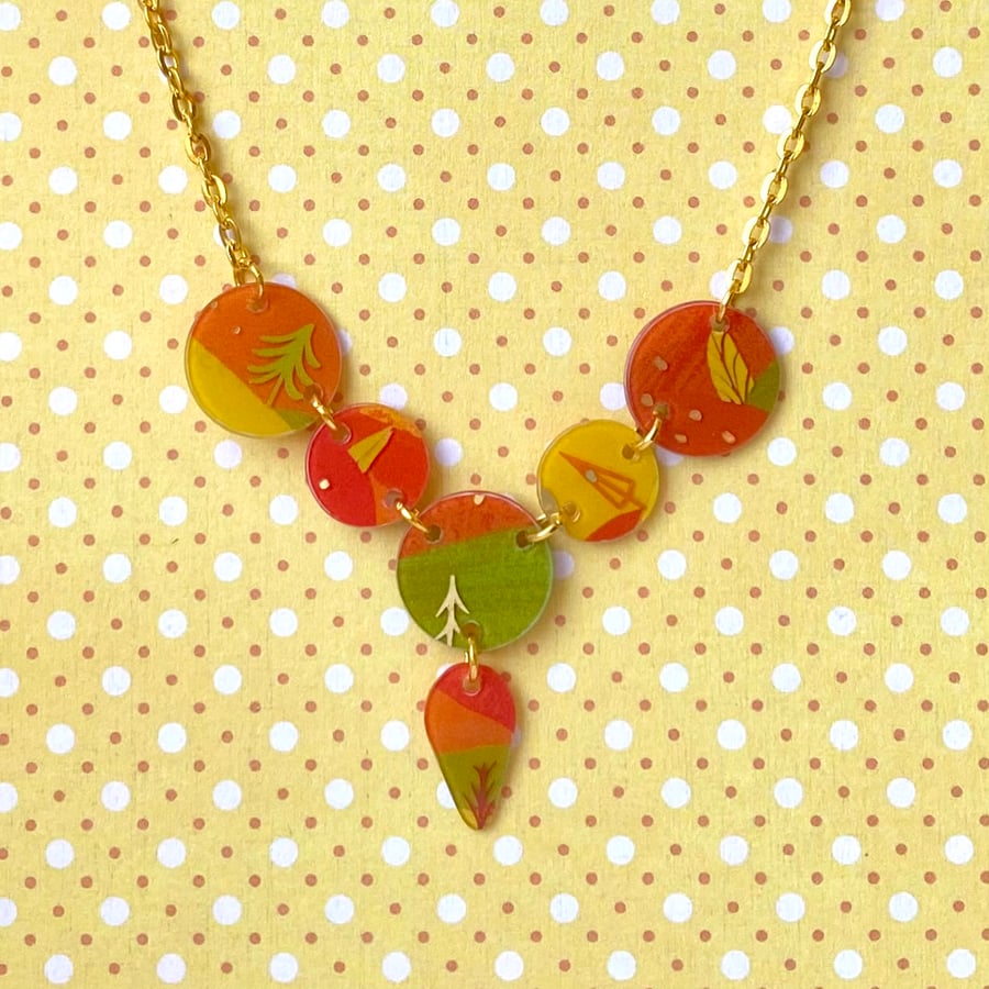 Recycled plastic multi disc orange, yellow & green tree themed necklace
