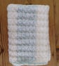 Handmade baby blanket in a white and ice blue colourway - Image 1
