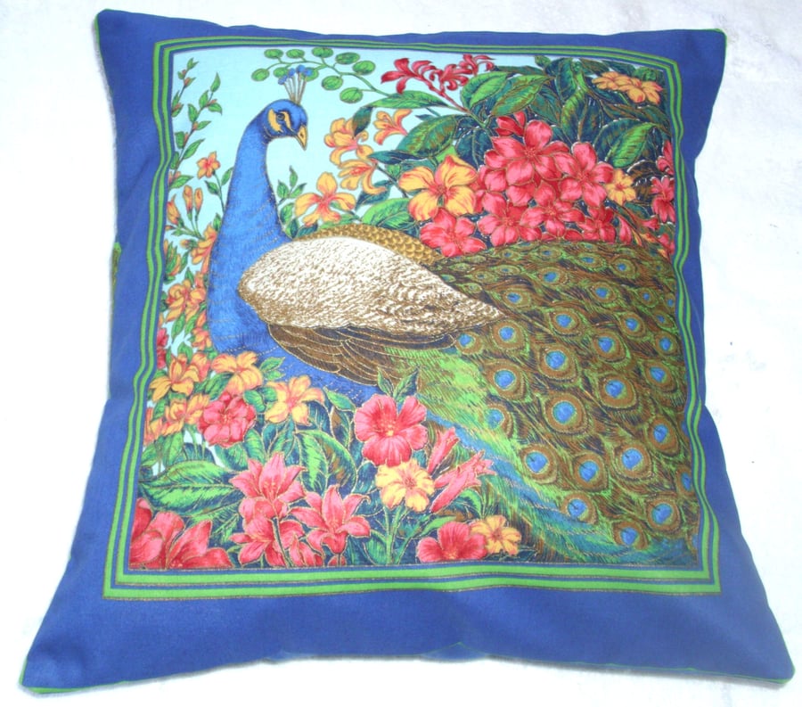 Peacock surrounded by exotic flowers cushion