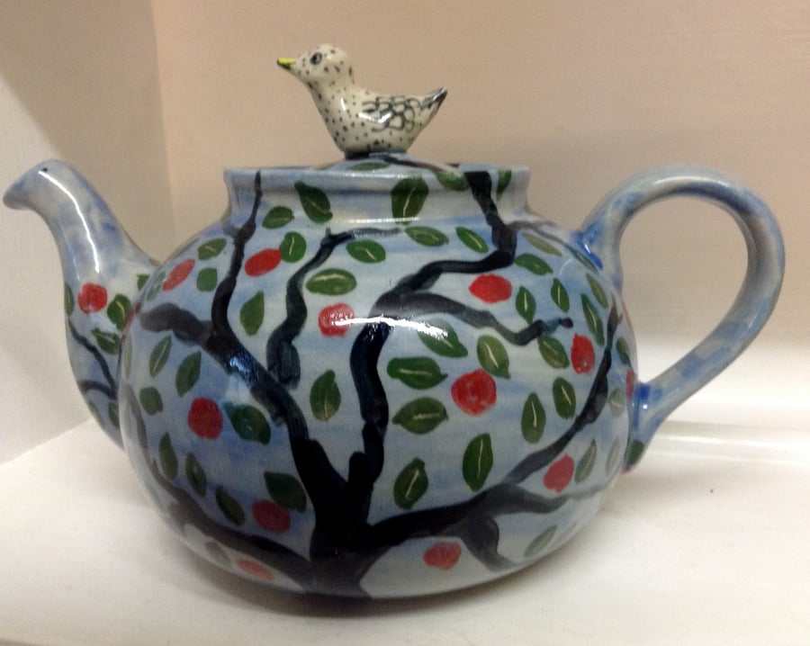 Teapot with apple tree design and bird lid