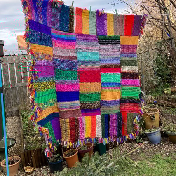 Hand knitted chunky multicoloured blanket 
