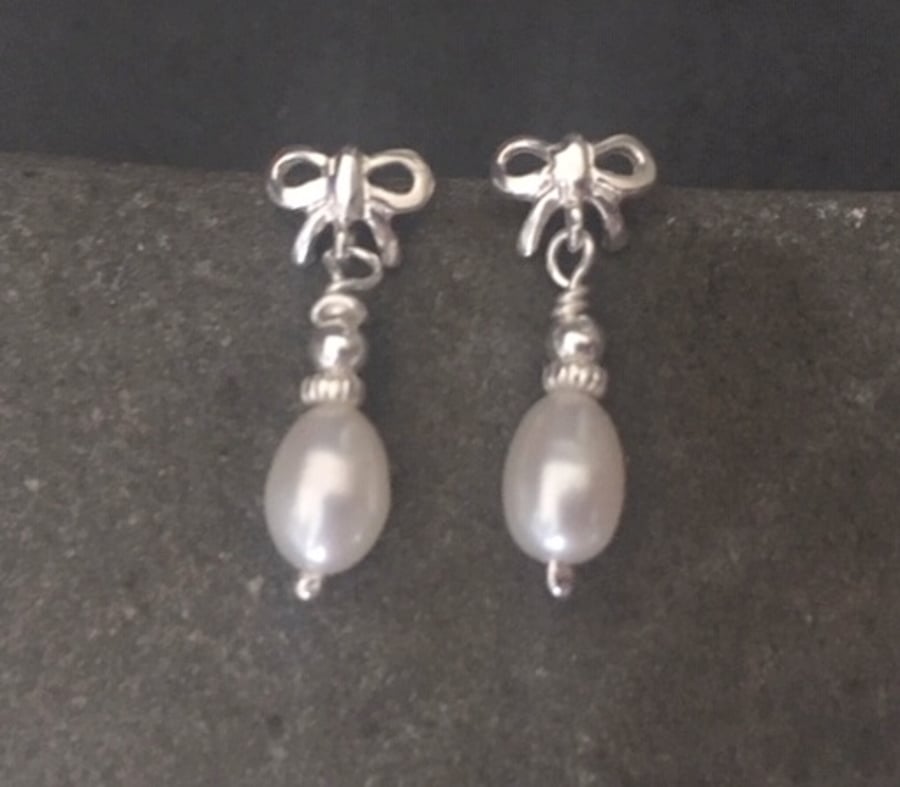 Sterling Silver White Pearl Bow Dangle Stud Earrings