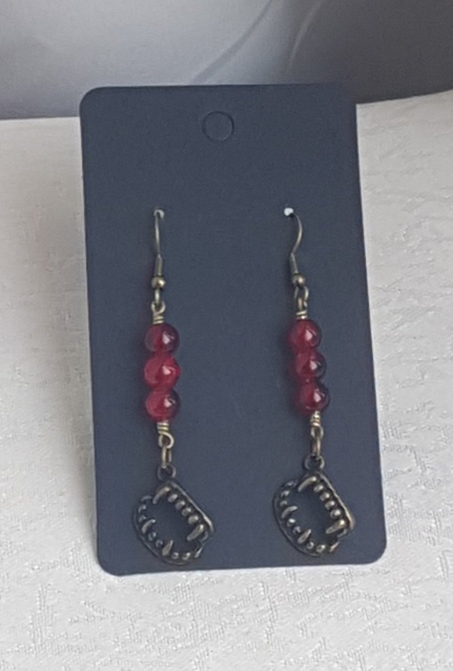 Might Bite Vampire Fang Red Bead Earrings - Dark Tones