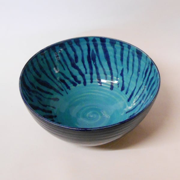 Bowl Turquoise and blue striped glazed Ceramic.