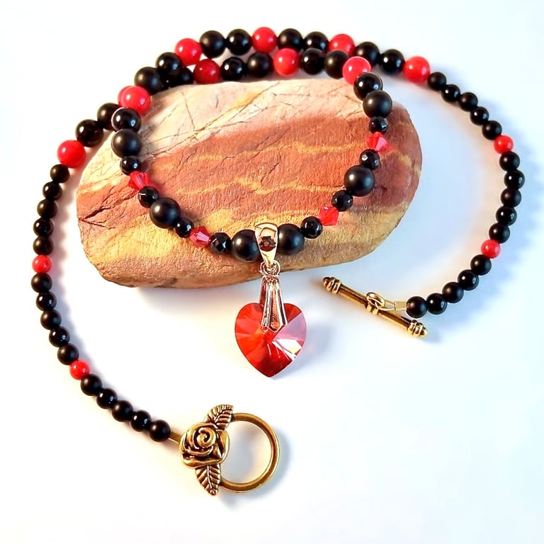 Ruby Red Swarovski Crystal Heart, Black Onyx And Red Bamboo Coral Necklace.