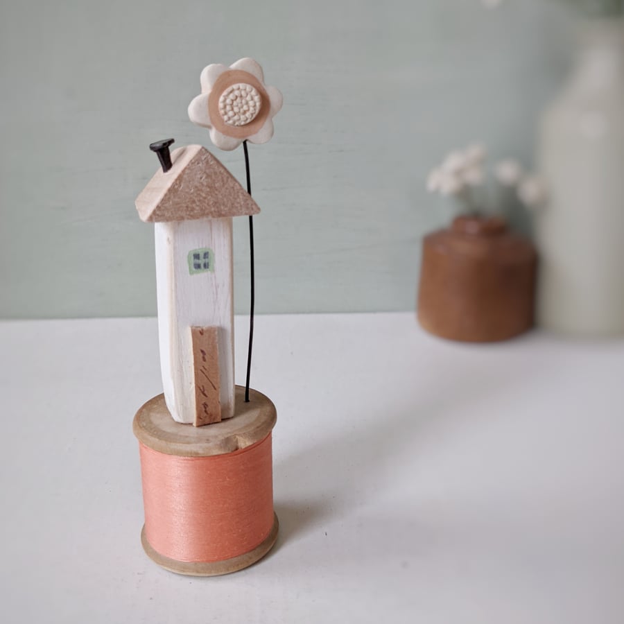 Wooden House on a Vintage Bobbin with Clay Flower