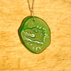 Gin bottle dragon pendant
