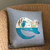 Handprinted & appliquéd cushion Otter