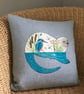 Handprinted & appliquéd cushion Otter