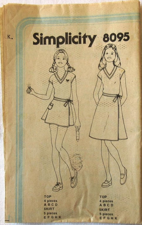 An uncut sewing pattern for a girl's t-shirt top and wrap skirt in 2 lengths 
