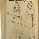 An uncut sewing pattern for a girl's t-shirt top and wrap skirt in 2 lengths 