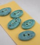 5 Small Oval Eggshell Blue Ceramic Buttons - Image 2