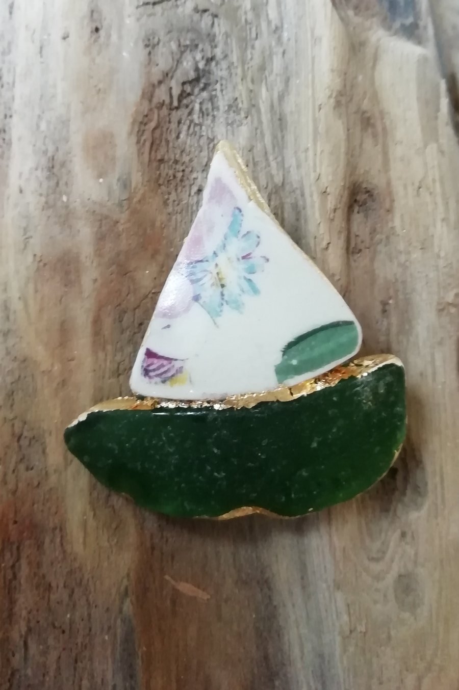 Boat beach pottery and glass brooch 