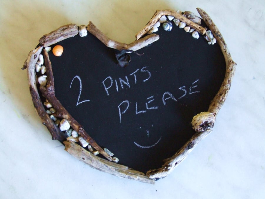 HEART SHAPED CHALKBOARD WITH DRIFTWOOD SURROUND FOR DISPLAY IN BEACH HUT 