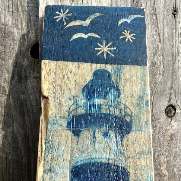 Cyanotype printed lighthouse on driftwood