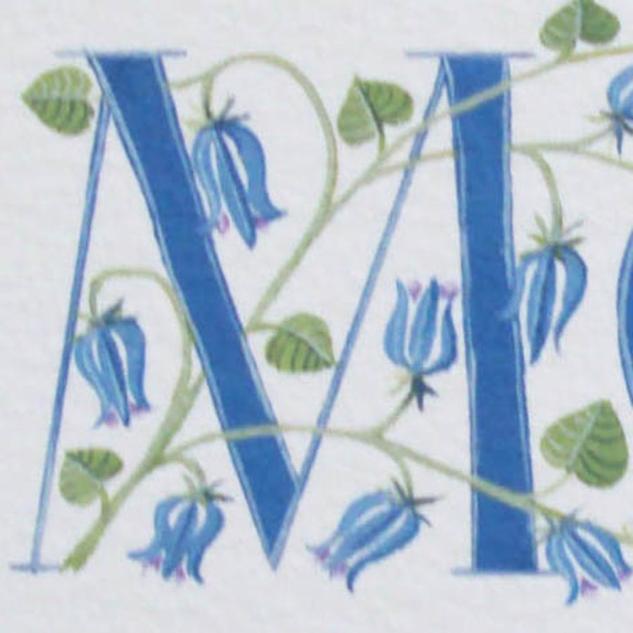 Initial letter M in turquoise with bluebells.